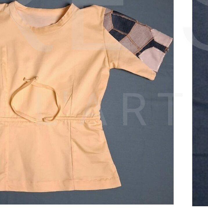 Haut pêche vu de face, poche plaquée et ceinture nouée.